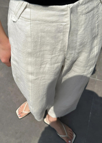 Pantalon court décontracté en lin à taille haute avec poches patchwork blanc pour l'été VB1033