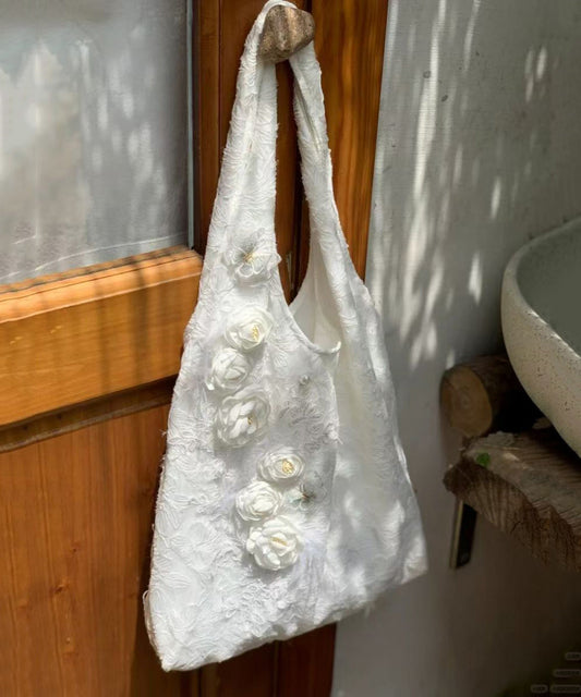 Sac à main chic en toile blanche à décor floral WI037