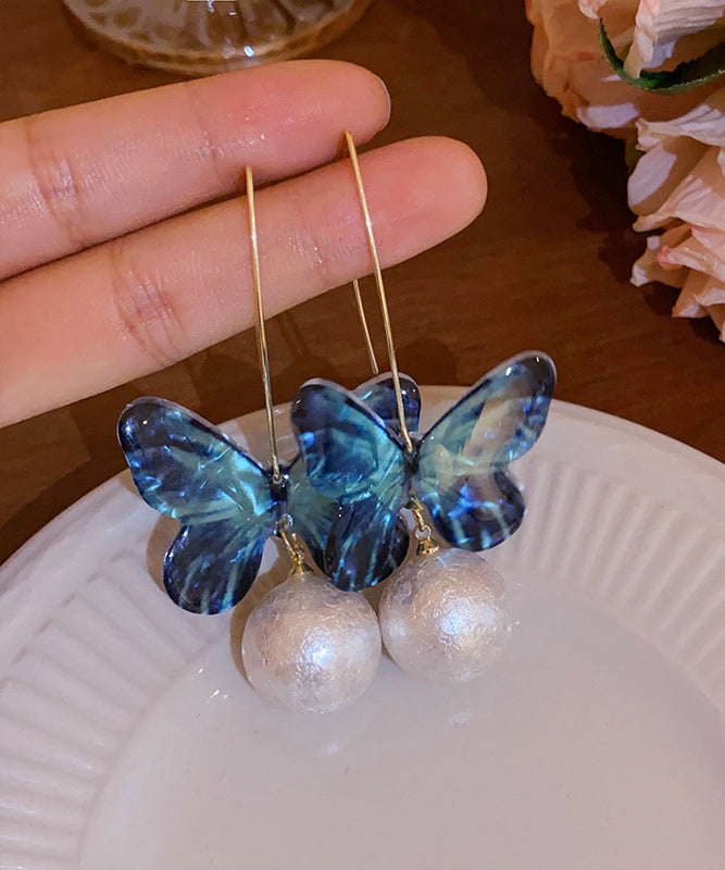 Boucles d'oreilles pendantes en forme de papillon avec perles en acrylique bleu fin PO076