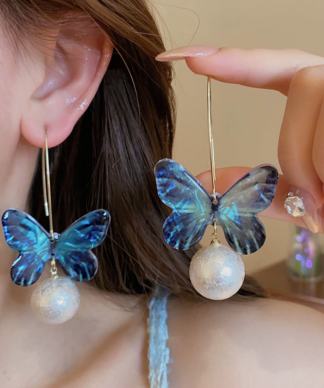 Boucles d'oreilles pendantes en forme de papillon avec perles en acrylique bleu fin PO076