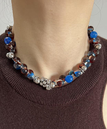 Collier en acier inoxydable et acrylique bleu fin WO016